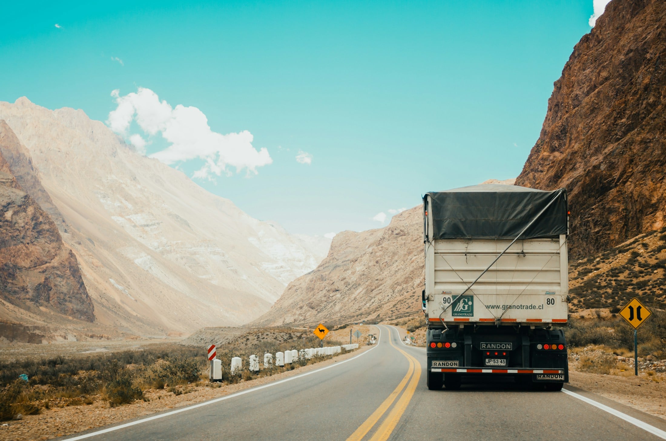 Freight truck travelling on a mountain highway